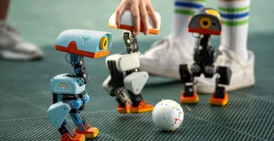 microduck-robot-forma-pato-hugging-face-canta-juega-futbol