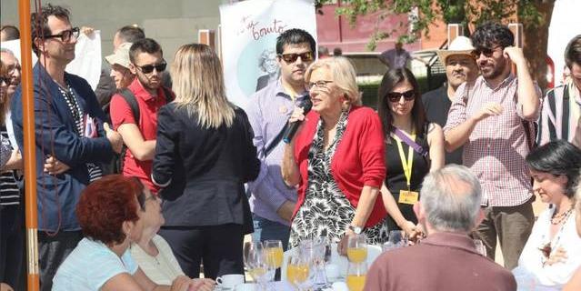 Activistas antidesahucios en un acto de Más Madrid: "Botella desahuciaba, Carmena también"