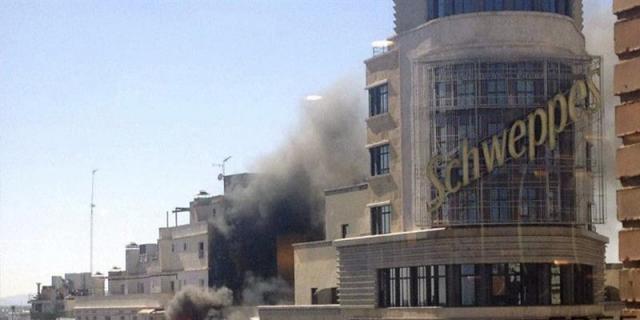 Controlan el fuego en el edificio Capitol de la Gran Vía de Madrid, sin daños graves ni heridos
