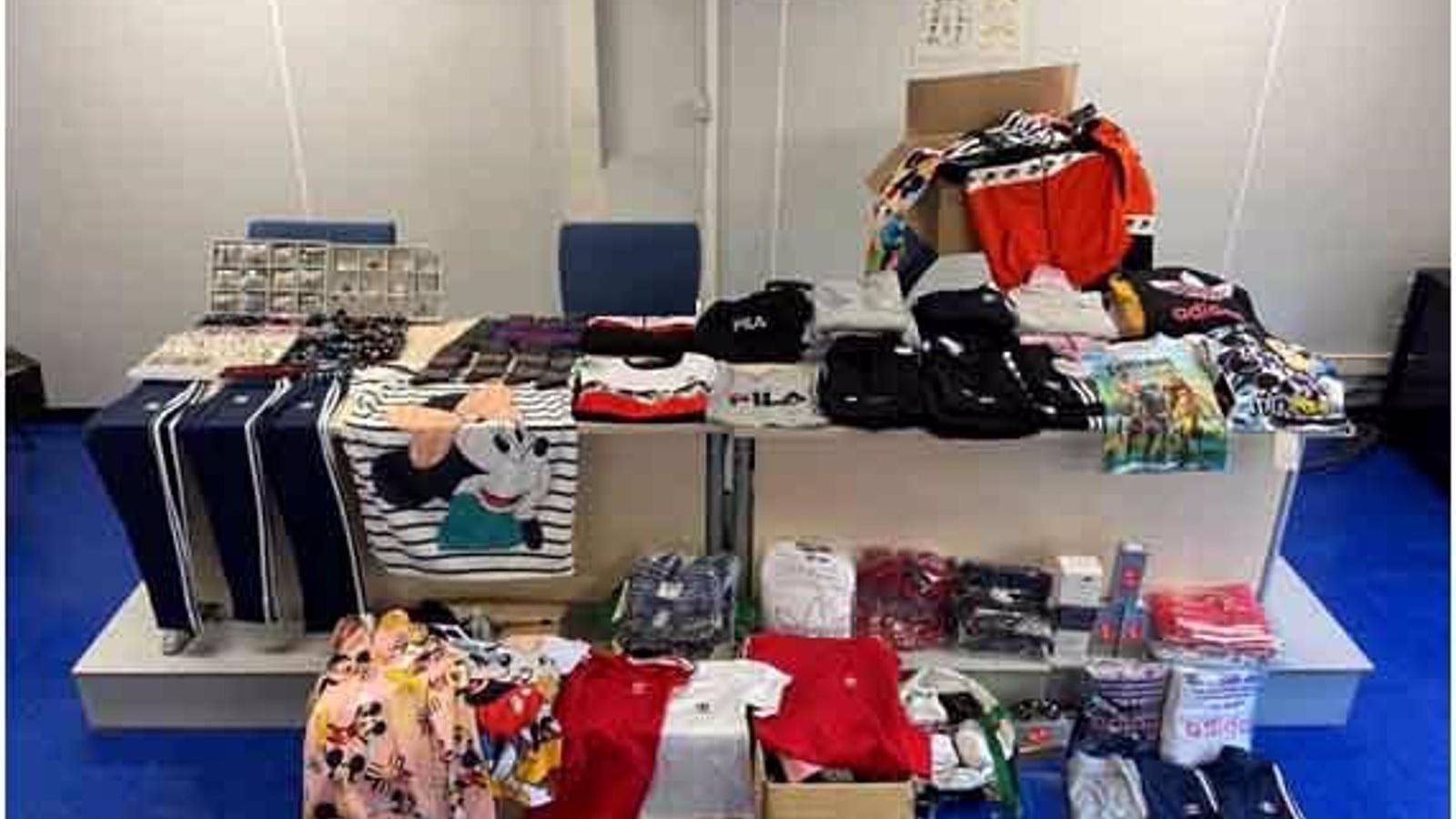 Tres imputados con 453 prendas falsificadas en dos tiendas de Carabanchel