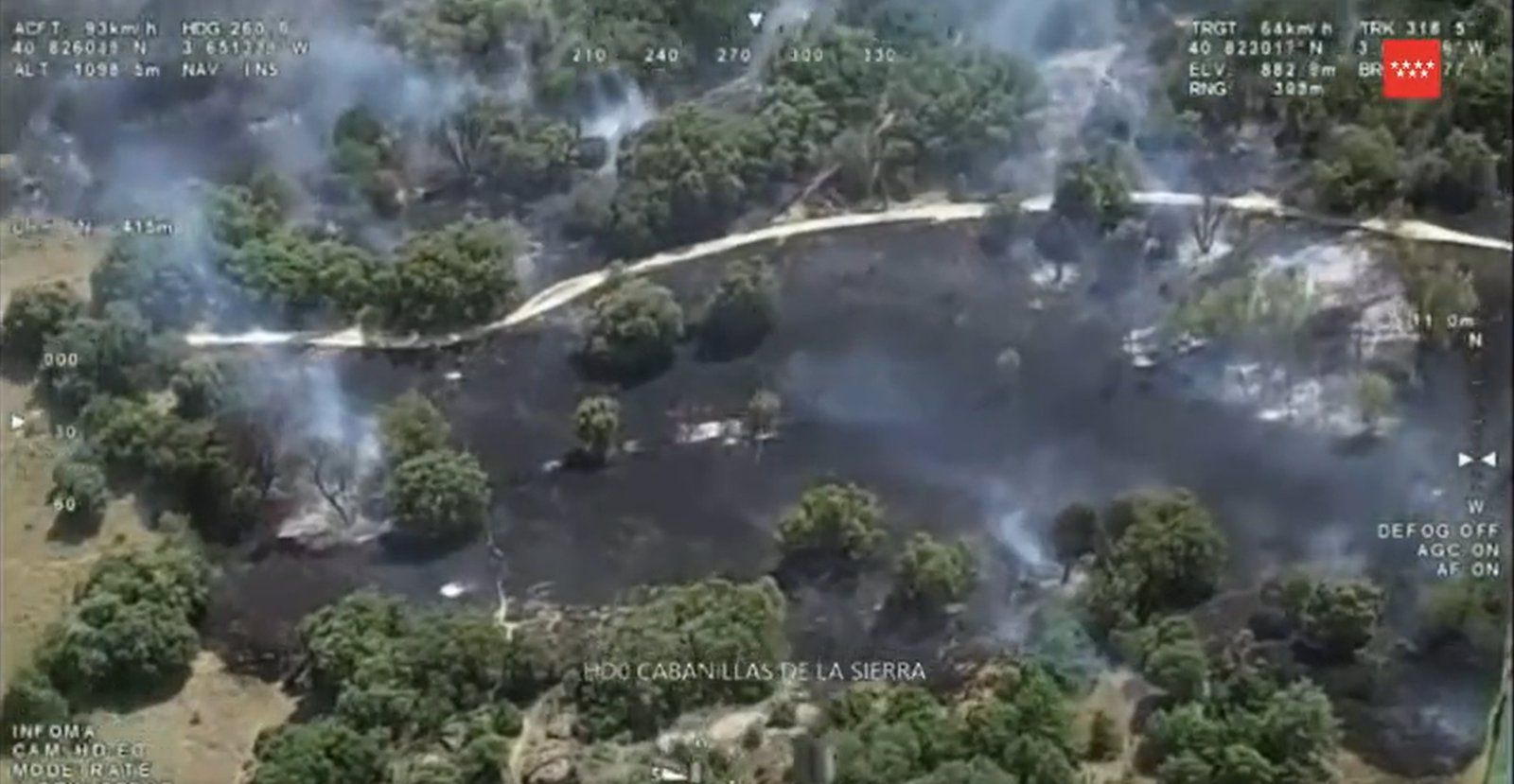 Sofocado un incendio de pasto y monte bajo próximo a una urbanización en Cabanillas de la Sierra