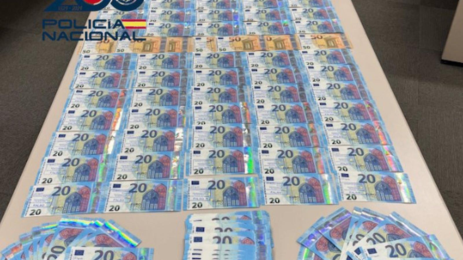 Dos detenidos por introducir en Madrid billetes falsos desde Italia mediante compras de móviles de segunda mano
